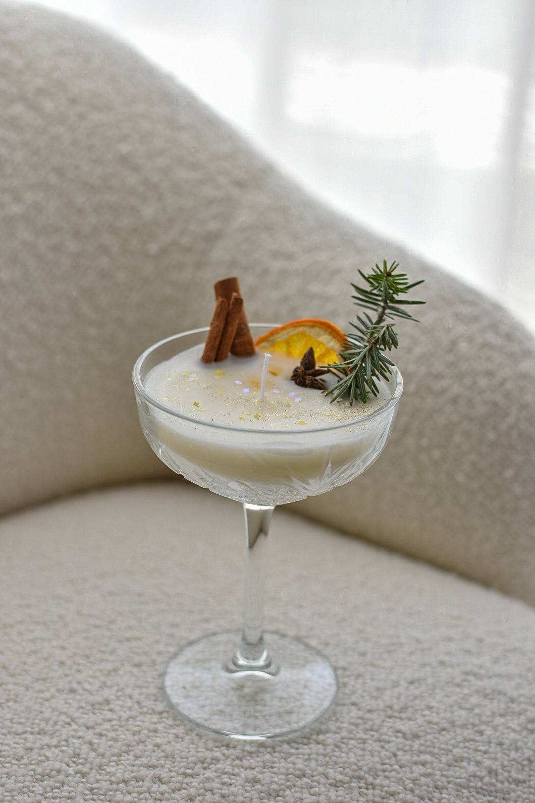 Copa champagne con canela y naranja